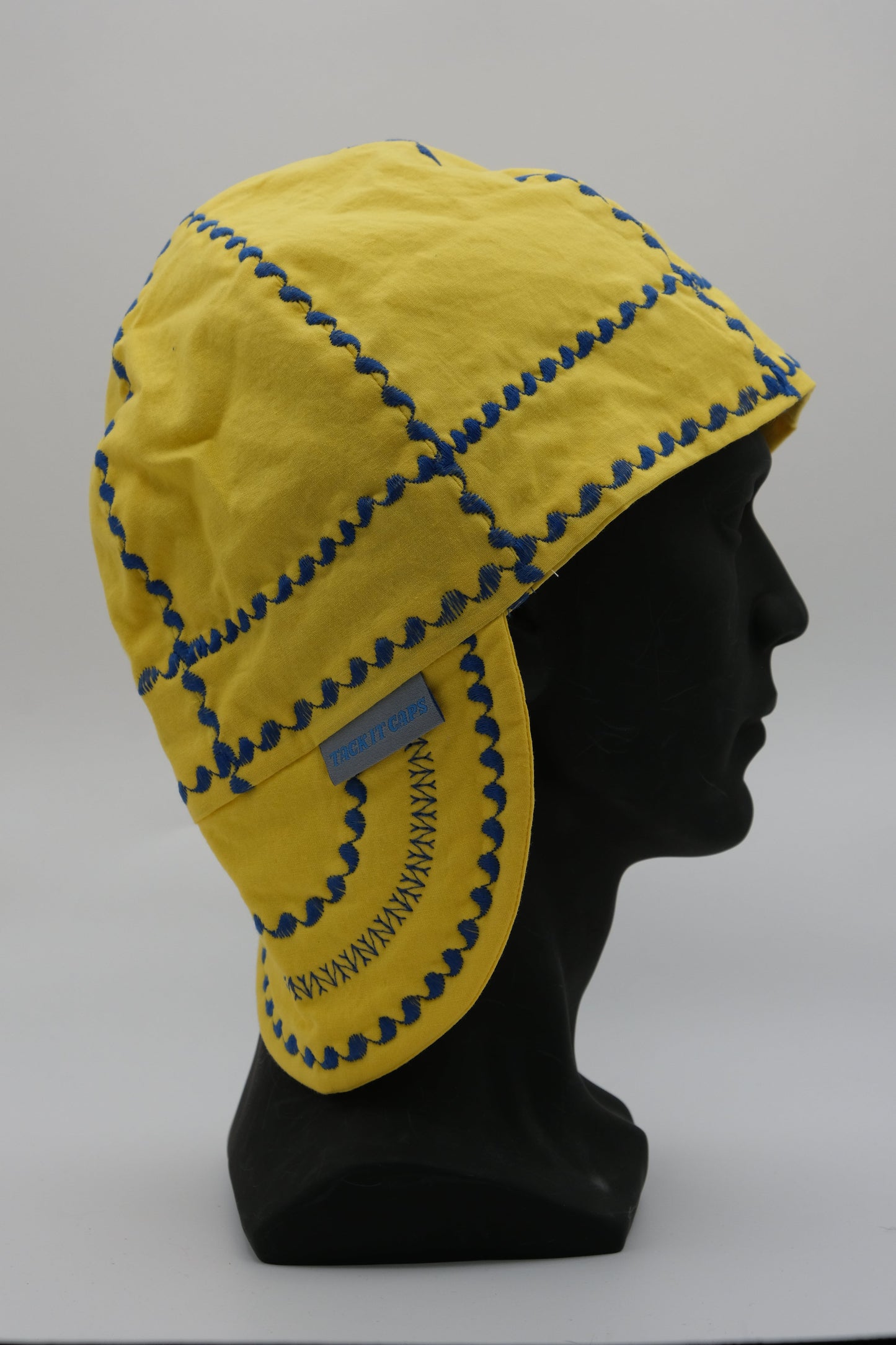 Yellow Cap with Purple Stitching